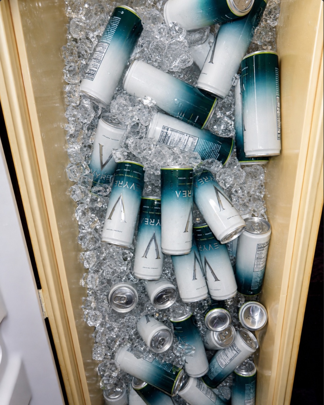 A cooler packed with iced VYRE cans